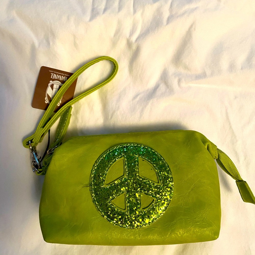 Hananel lime green wrist bag with glitter peace sign embellishment. Brand new.